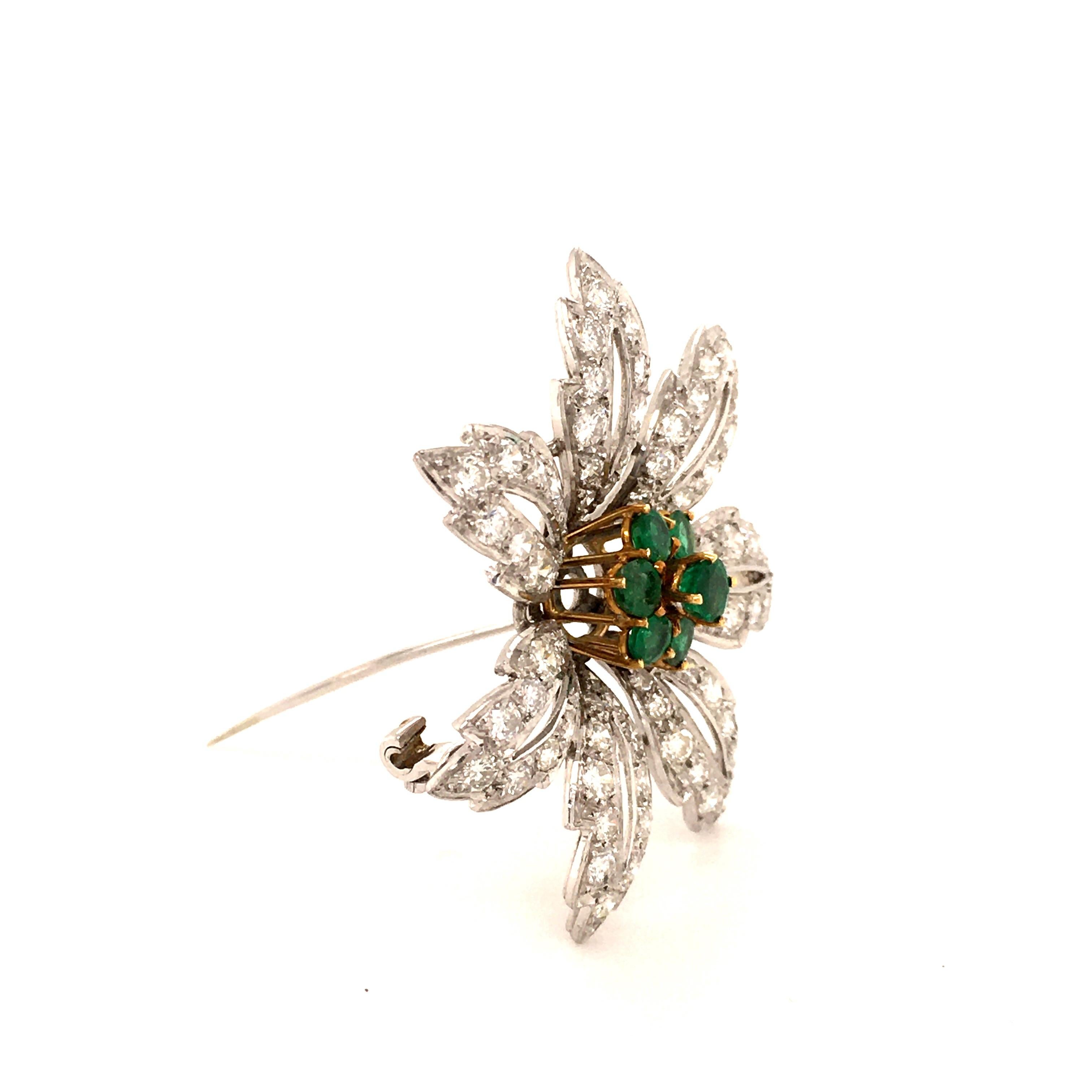 Round Cut Emerald and Diamond Flower Brooch in 14 Karat White and Yellow Gold