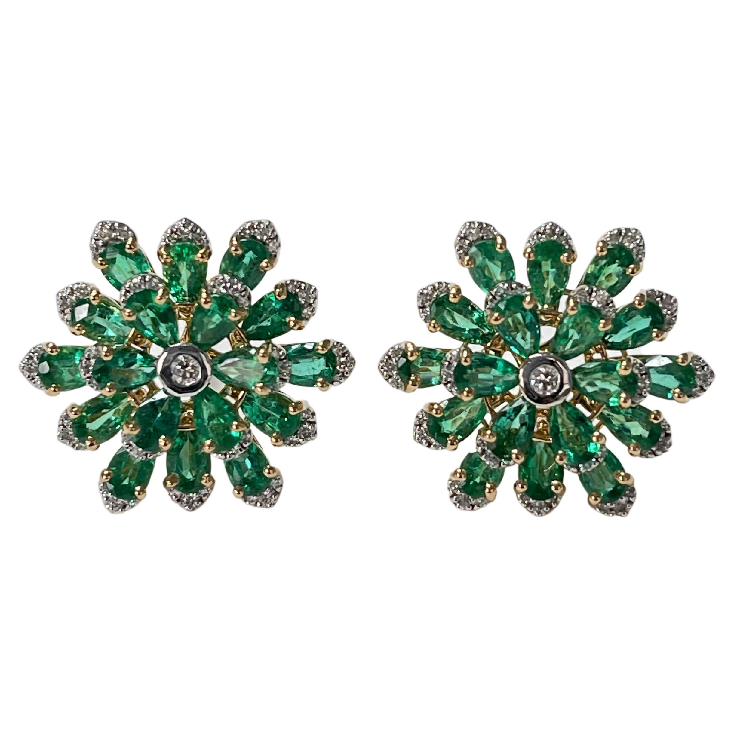 Our Gorgeous Emerald and Diamond flower stud earrings are beautifully hand crafted in 18 karat yellow gold. 
The details are as follows : 
Emerald weight : 7.48 carat ( vivid green color ) 
Diamond weight : 0.57 carat ( GH color and VS clarity )