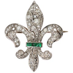 Emerald and Diamond Gold and Platinum Fleur-de-Lis Brooch