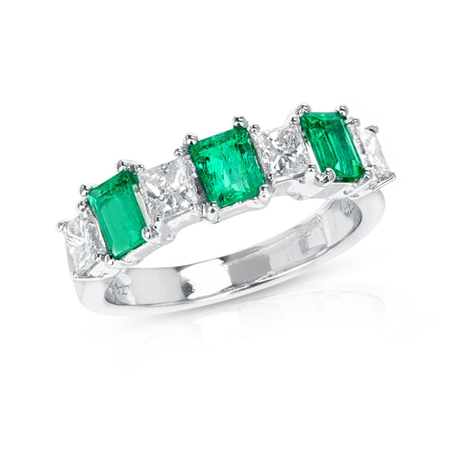 An Emerald and Diamond Half Band Ring made in 18K White Gold. The weight of the ring is 5.20 grams. Ring Size US 6.50.

