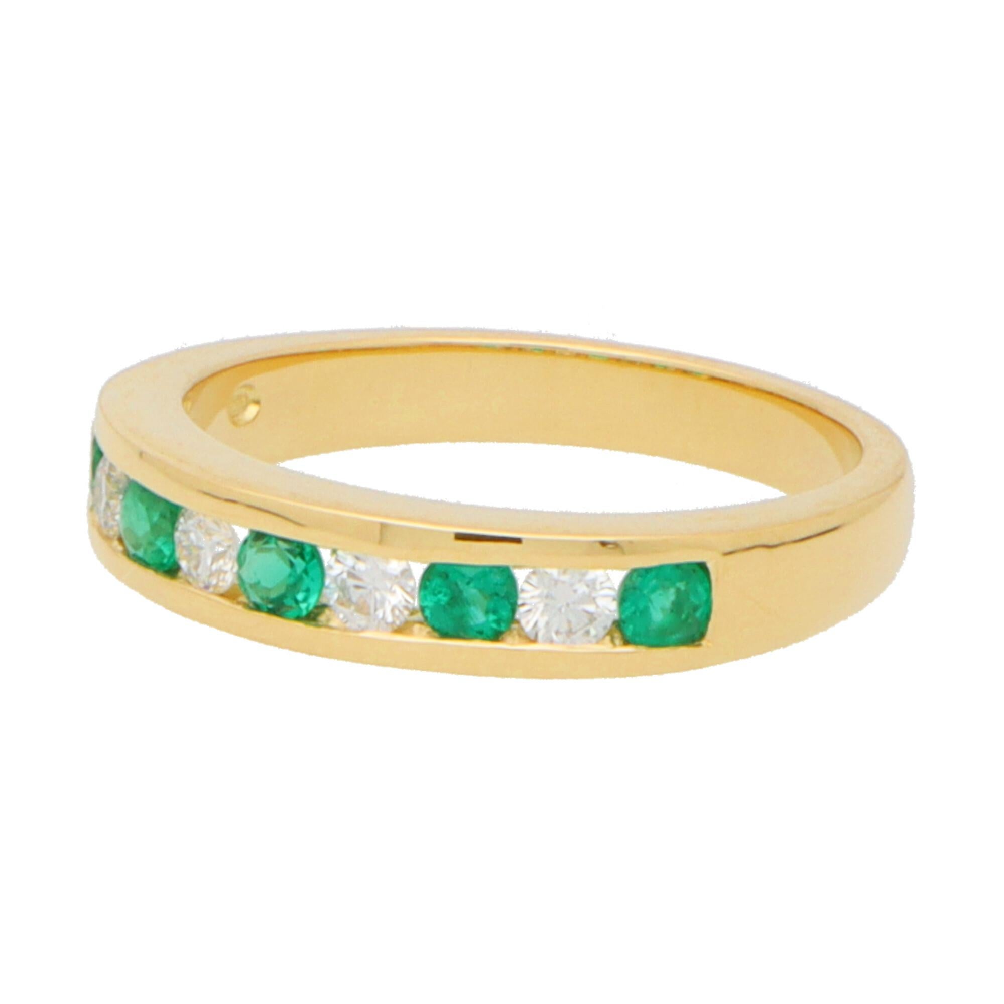 A sensational diamond and emerald half eternity ring set in 18k yellow gold. 

The ring is composed of 9 round cut stones altogether, 5 of which being emeralds and 4 diamonds. All the stones are perfectly bezel set within a 4mm yellow gold