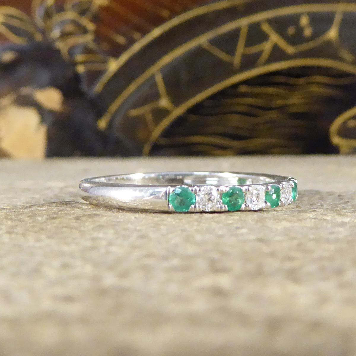 Modern Emerald and Diamond Half Eternity Ring in White Gold For Sale