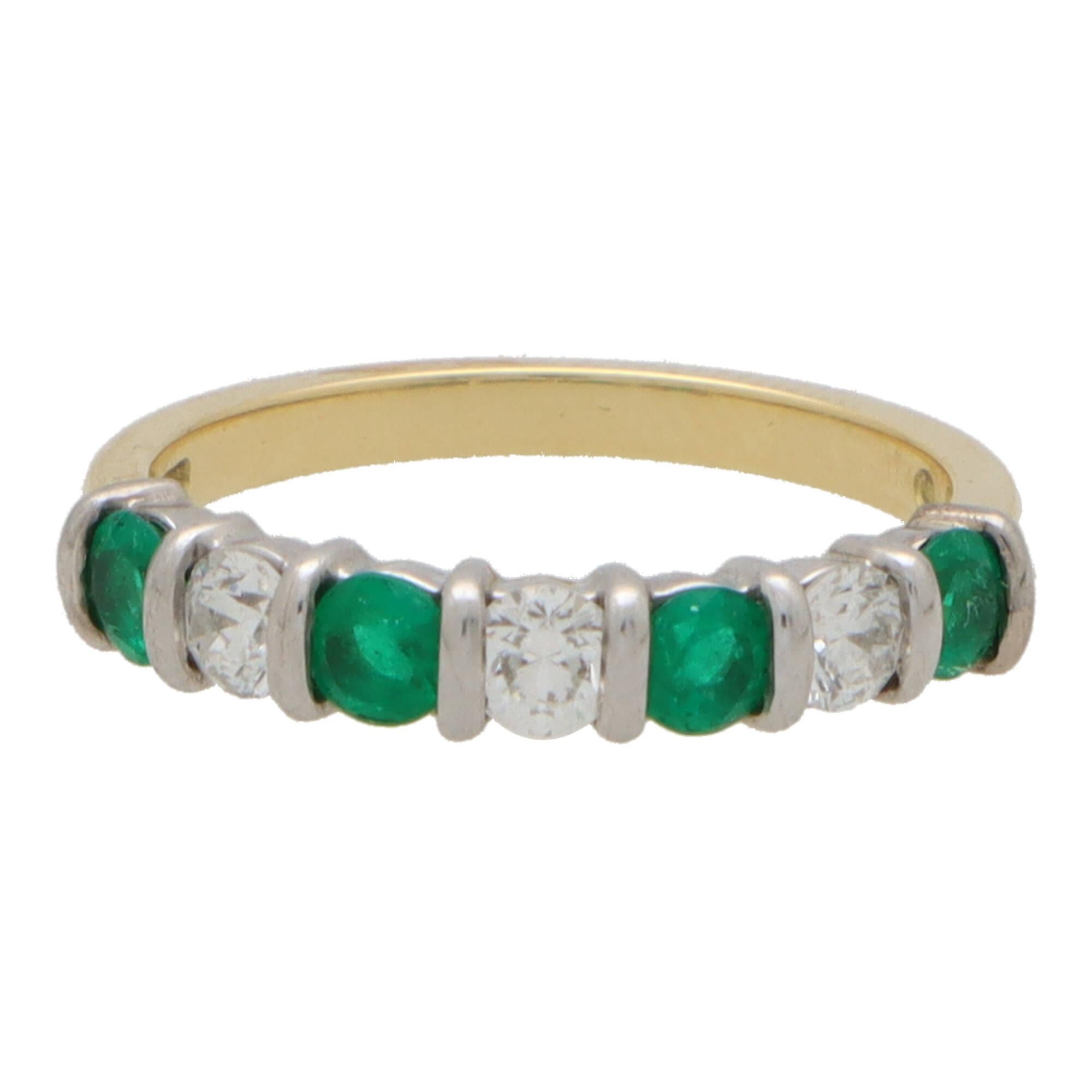  A lovely diamond and emerald half eternity ring set in 18k yellow and white gold. 

The ring is composed of 7 round cut stones altogether, 4 of which being emeralds and 3 diamonds. All the stones are perfectly set in white gold within a 2mm yellow