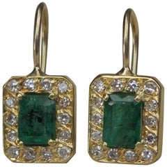 Vintage Emerald and Diamond Halo Earrings