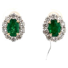 Emerald and Diamond Halo Earrings in 18KW Gold