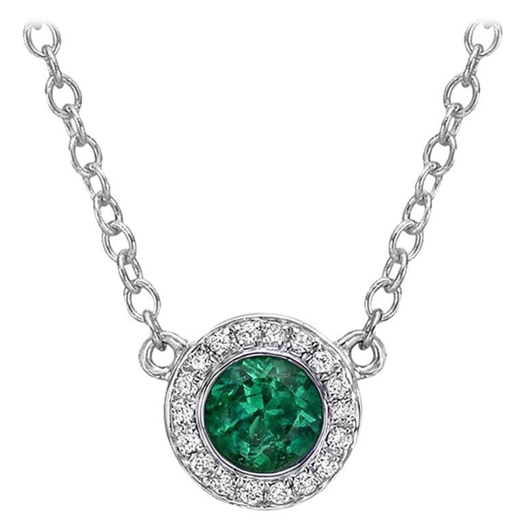 Emerald and Diamond Halo Pendant For Sale