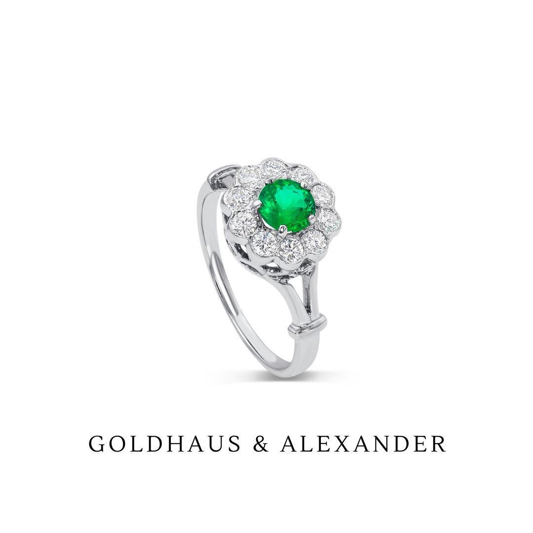 This extraordinary engagement ring features a beautiful and vivid Emerald gemstone set in a classic and timeless design. It is truly a very lovely and romantic jewel.

18K white gold ring with Emerald center stone and Diamonds.

Emerald: 0.41ct,