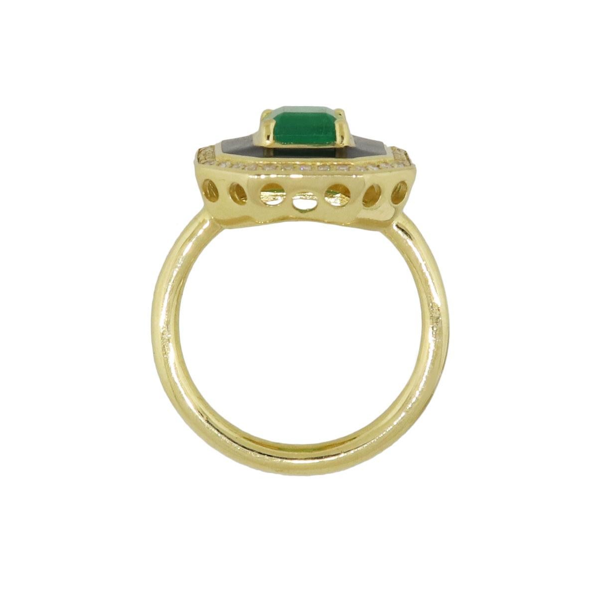 Material: 18k Yellow Gold
Diamond details: Approximately 0.15ctw of round brilliant diamonds. Diamonds are G/H in color and VS in clarity
Gemstone details: Emerald cut emerald approximately 1.75ct.
Measurements: 1.04″ x 0.71″ x 0.85″
Ring Size: 7