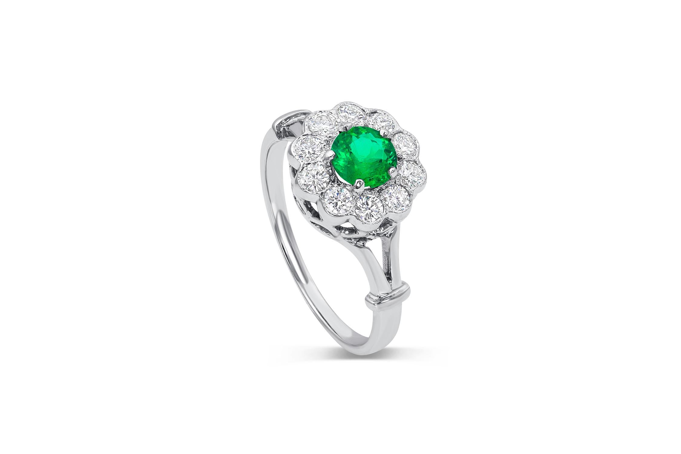 Round Cut Emerald and Diamond Halo Ring For Sale
