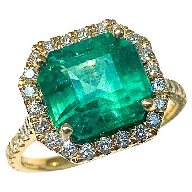 Smaragd- und Diamant-Halo-Ring