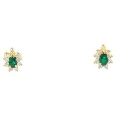 Emerald and Diamond Halo Stud Earrings in Yellow Gold Emerald and Diamond Halo Stud Earrings in Yellow Gold
