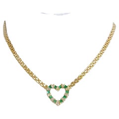 Emerald and Diamond Heart Necklace in 14k Yellow Gold
