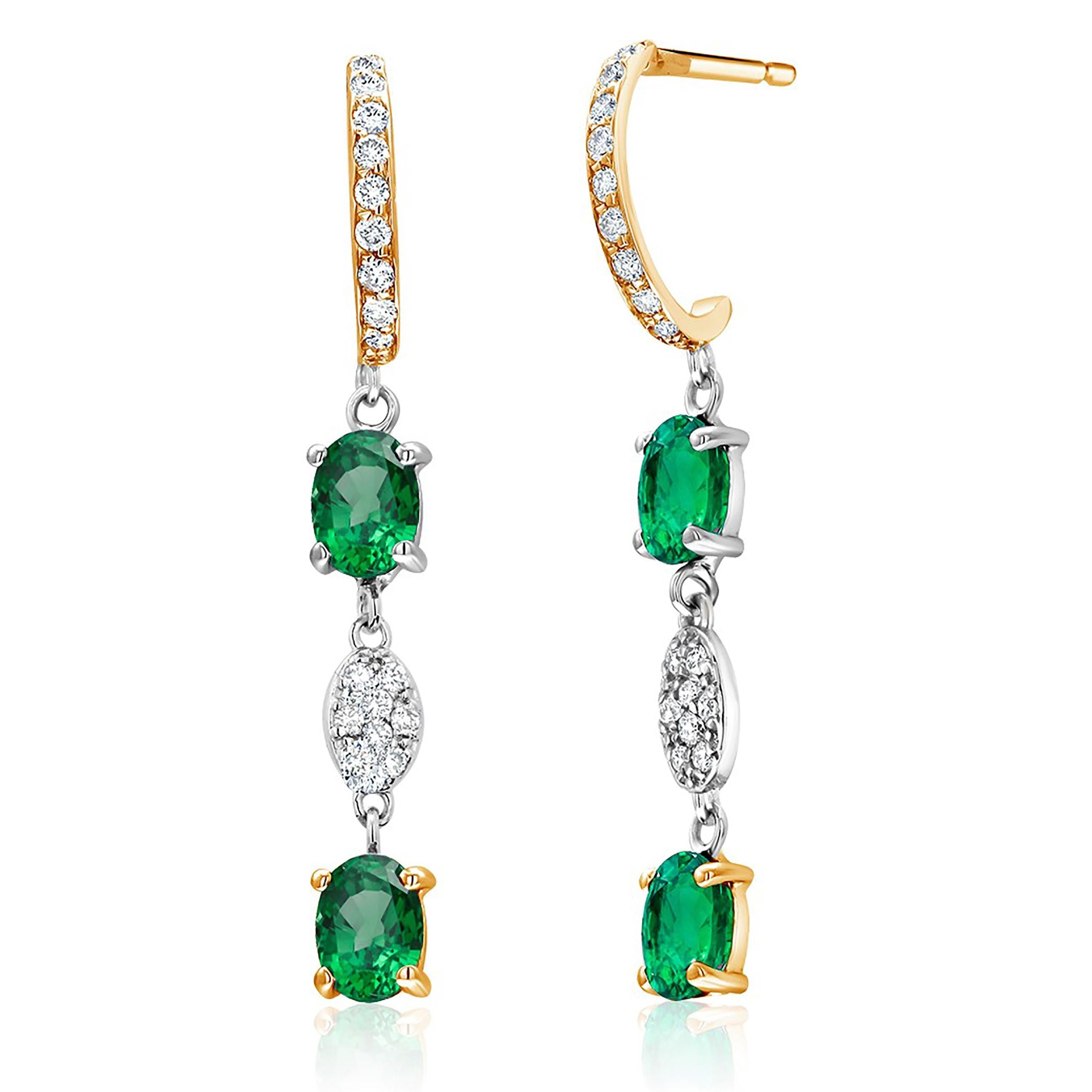 Fourteen karats yellow and white gold hoop drop earrings 
Diamond weighing 0.45 carat
Four Colombian emeralds weighing 2.12 carats
Four oval-shaped emeralds tone color is of Parakeet green 
One of a kind earrings
Four bright and vivid green matched