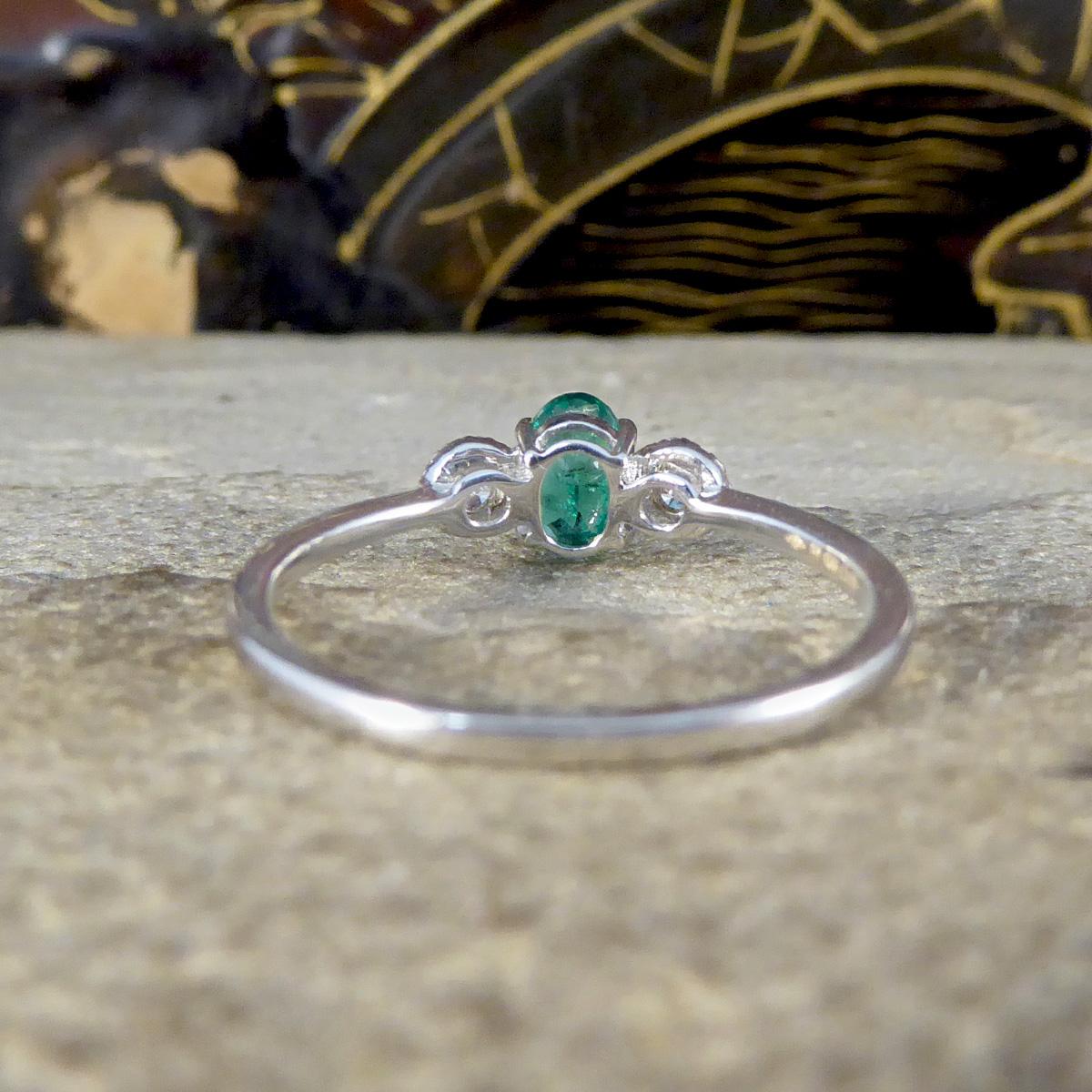 Modern Emerald and Diamond Illusion Three Stone Ring in 18ct White Gold For Sale