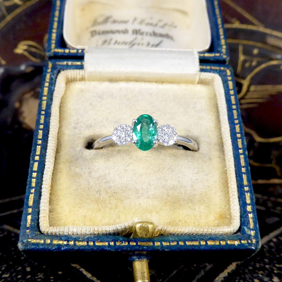 Women's Emerald and Diamond Illusion Three Stone Ring in 18ct White Gold For Sale
