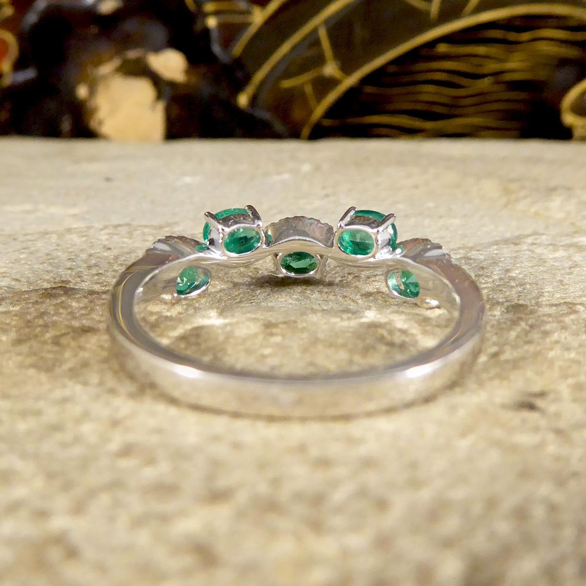 Oval Cut Emerald and Diamond Lazy River Ring in 18ct White Gold