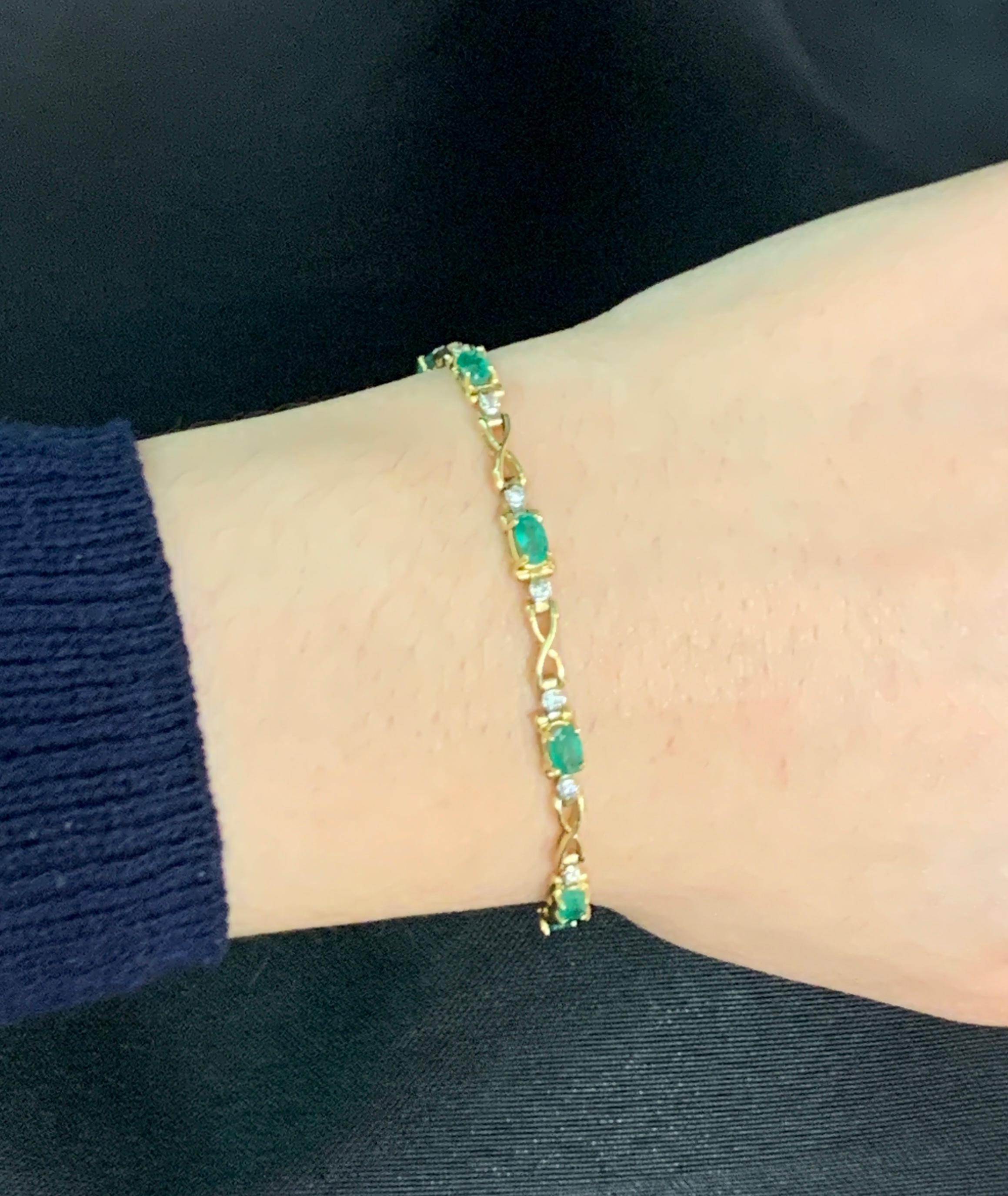 Emerald and Diamond Link Bracelet

Yellow gold link bracelet set with 10 oval cut emeralds and 19 round cut diamonds. 

Approximate Emerald Weights: 1.8 Carats
Approximate Diamond Weights: 0.76 Carats
Approximately measures 7