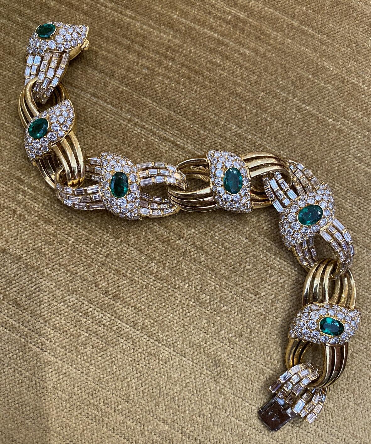 Emerald and Diamond Link Statement Bracelet by RCM in 18k Yellow Gold

Emerald and Diamond Bracelet features 6 deep vibrant green Oval shaped Emeralds surrounded with Pave set Round Brilliant Diamonds and Bar set Baguette Diamonds in 18k Yellow