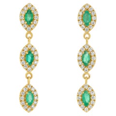 Orecchini a goccia con smeraldi e diamanti
