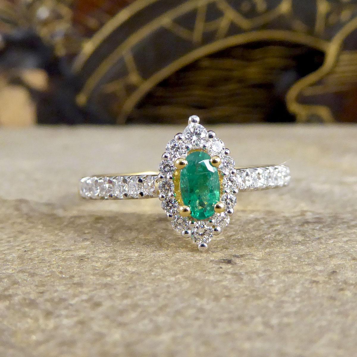 This ring features a beautiful and bright oval cut Emerald in the centre weighing 0.23ct with a marquise shaped halo surround of round cut Diamonds. The stone have all been set in a four claw setting with the Diamonds running all down either
