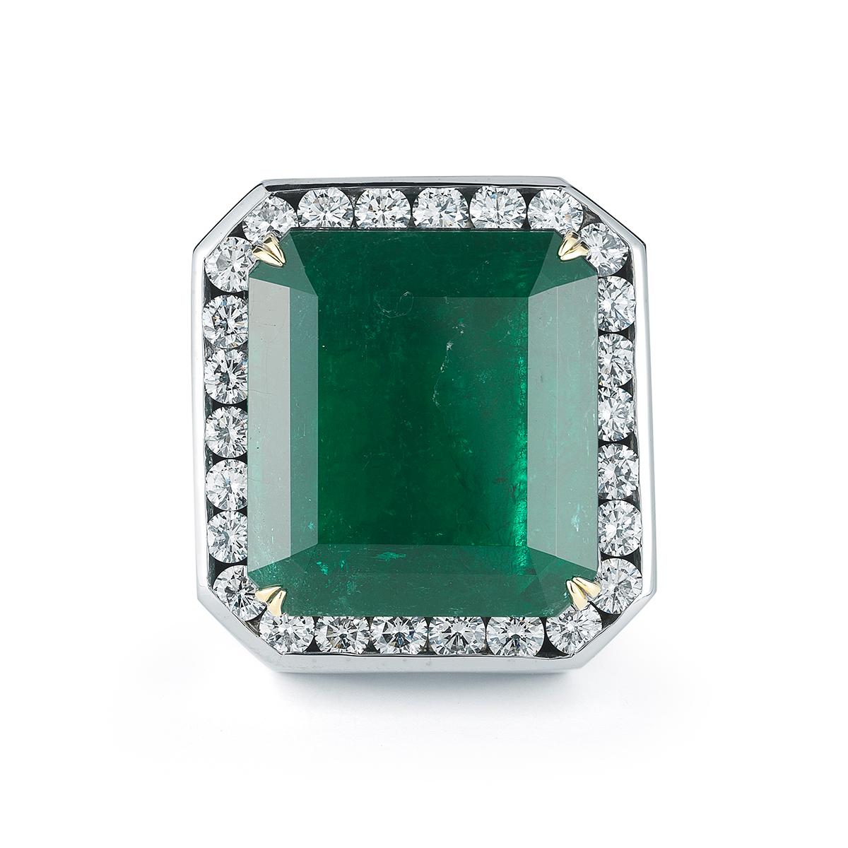 STRIKING EMERALD MENS RING BY RAYAZTAKAT
An impressive architectural white gold setting with diamond halo for the most discerning gentleman.
Item:	# 01827
Metal:	18k W
Lab:	Gia
Color Weight:	44.82 ct.
Diamond Weight:	4.56 ct.
