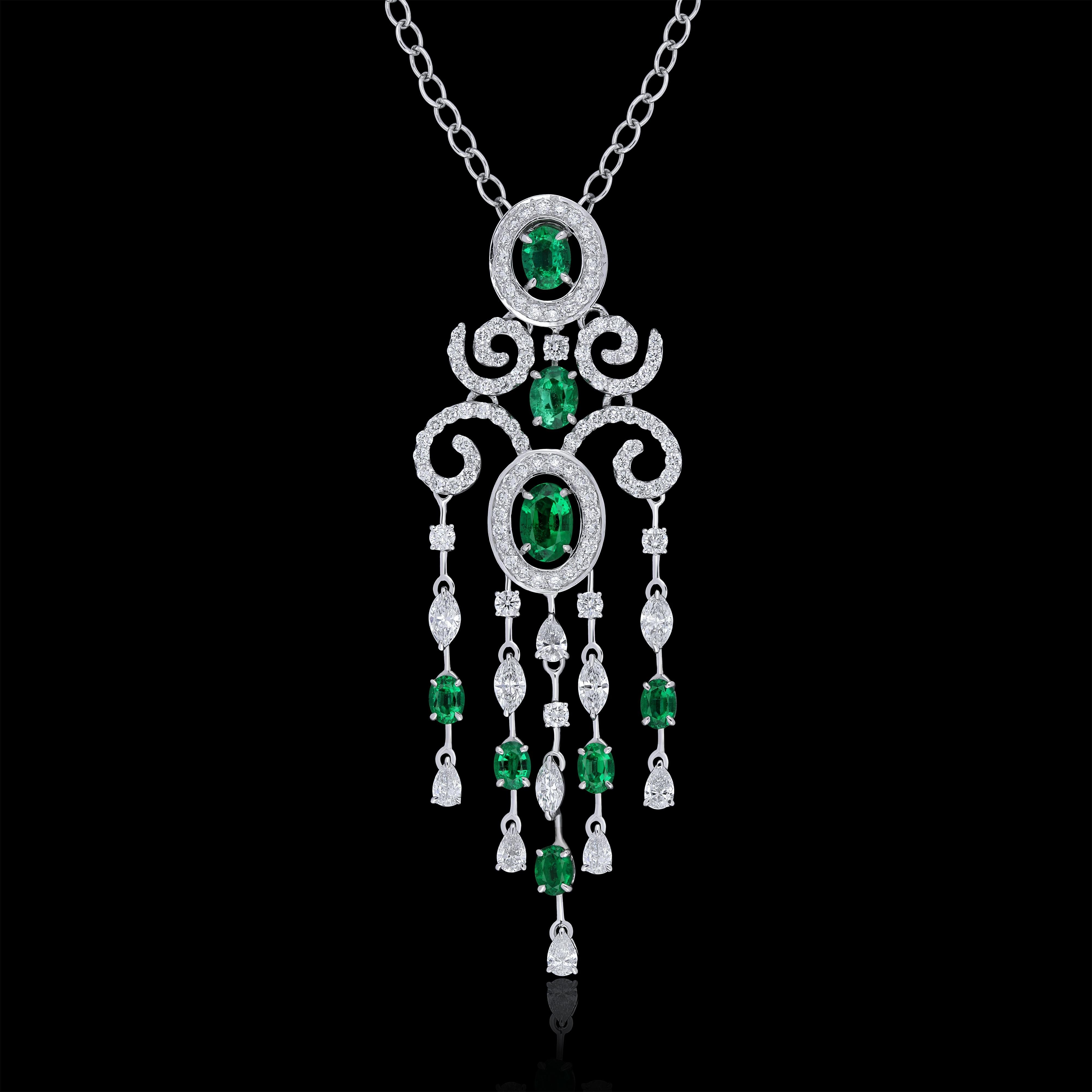 Elegant and exquisitely detailed 18 Karat White Gold Necklace, center set with 0.66Cts .Oval Shape Emerald and micro pave set Diamonds, weighing approx. 2.00Cts Beautifully Hand crafted in 18 Karat White Gold.

Stone Detail:
Emerald: 6x4MM, 5x4MM,
