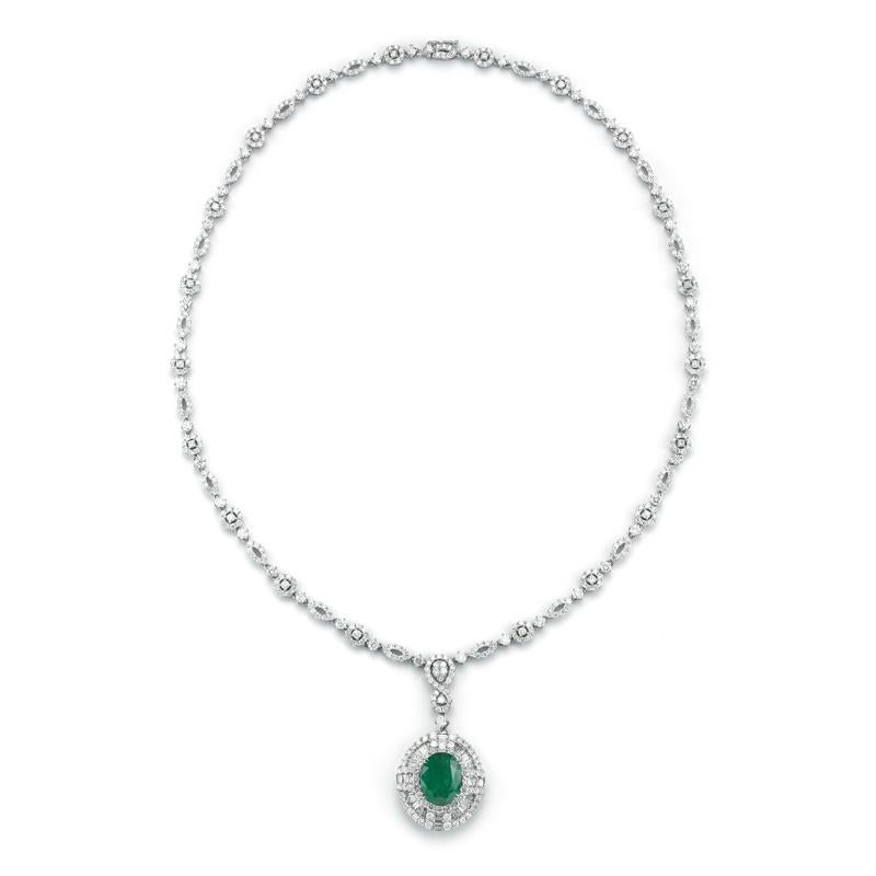 EMERALD AND DIAMOND NECKLACE
A deco inspired setting shows off a beautiful oval emerald.
Item:	# 02664
Setting:	18K W
Color Weight:	4.37 ct. of Emerald
Diamond Weight:	8.16 ct. of Diamonds
