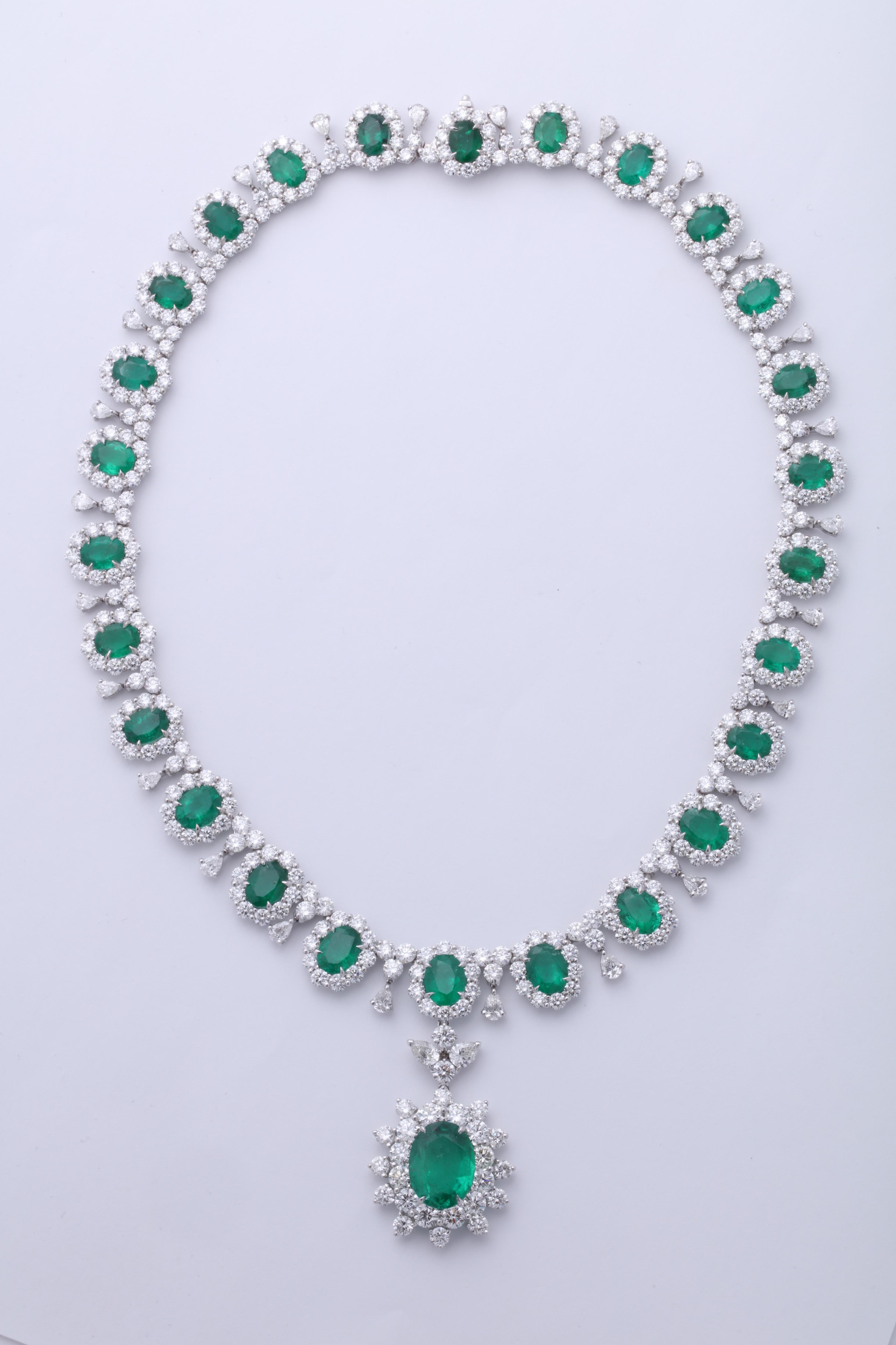 
A grand emerald and diamond necklace.

39.09 carats of fine green emerald, 48.47 carats of white round and pear shaped diamonds. 

Set in platinum

The necklace measures 16.5 inches but can easily be adjusted. 
It is also possible to make the