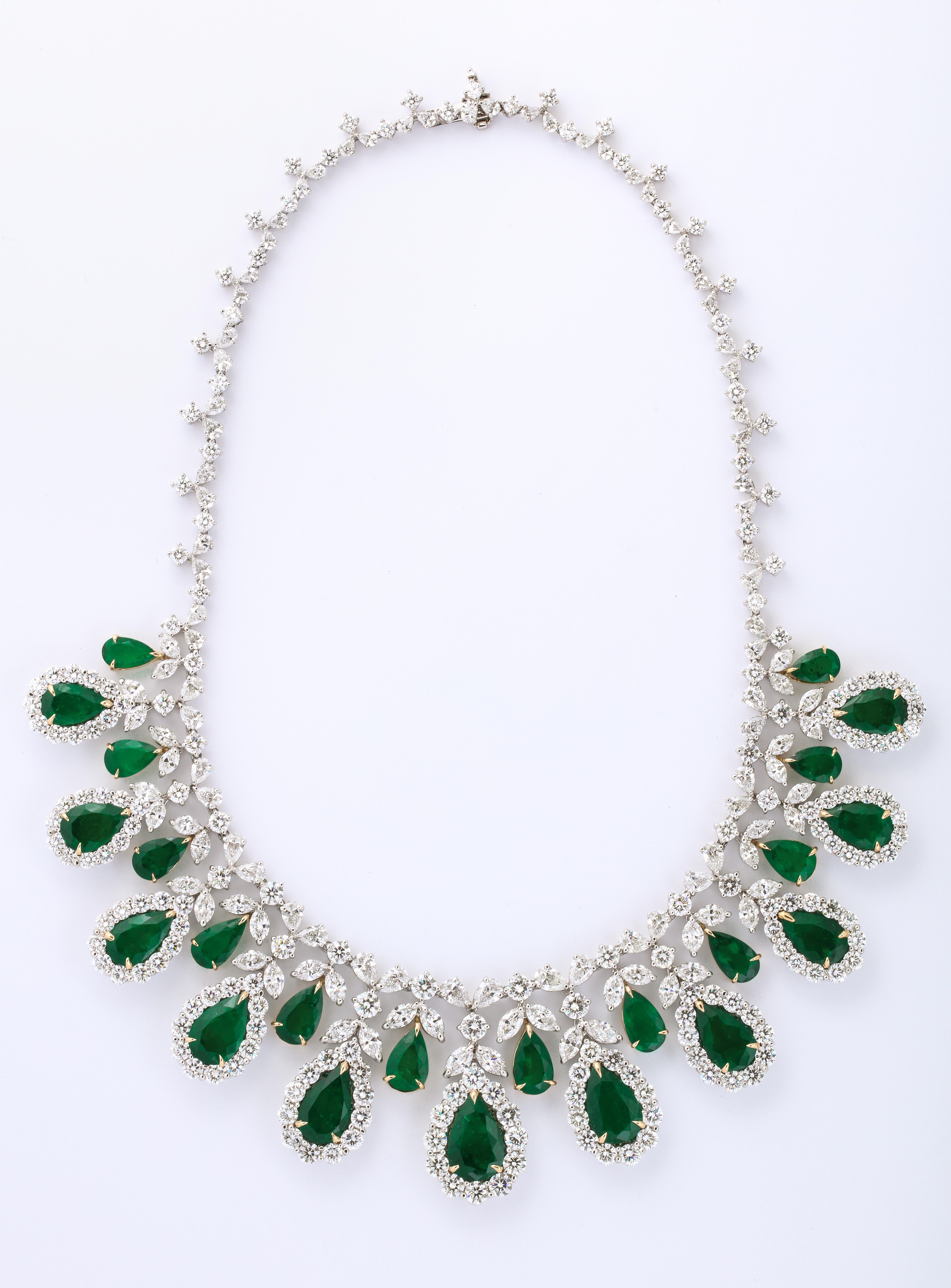 
Important Colombian Emerald and Diamond Drop Necklace 

45.85 carats of Intense to Vivid Green Colombian pear shaped emeralds 

63.02 carats of colorless white pear, round and marquise cut diamonds. 

Set in platinum 

16 inch length 

Certified by