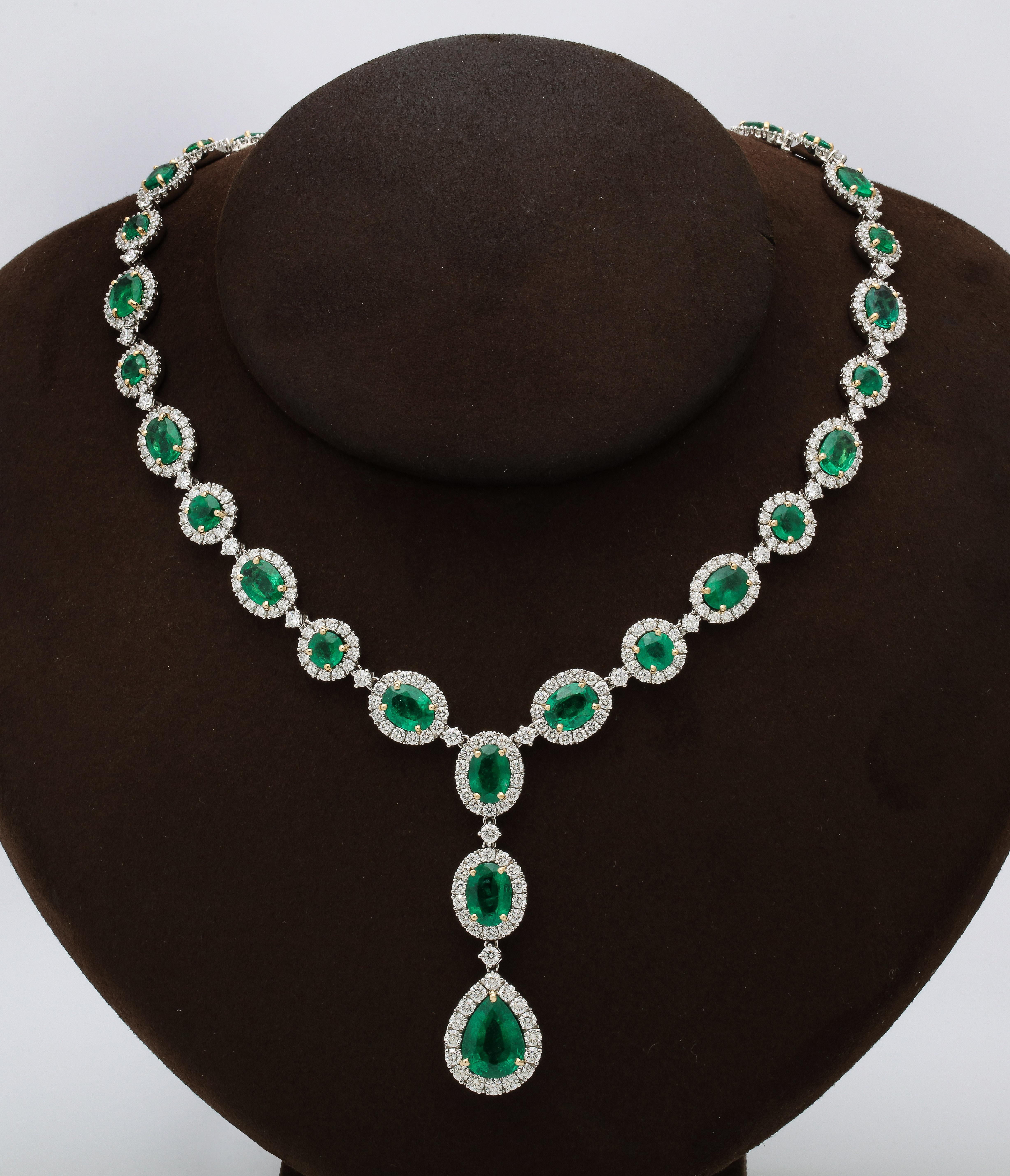 
An incredible piece! 

31.53 carats of Fine Green Emeralds. 

13.72 carats of white round brilliant cut diamonds. 

Set in platinum and 18k yellow gold. 

16 inch length, 2 inch center drop. 