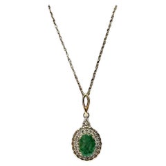 Emerald and Diamond Necklace in 10kt Yellow Gold - 0.18ctw Diamonds, 6.8x5mm Em.