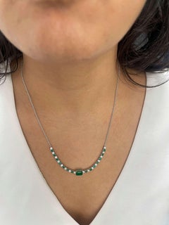 Emerald and Diamond Necklace in 14K White Gold