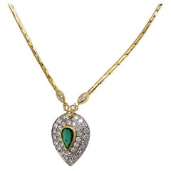 Emerald and Diamond Necklace in 18 Karat Gold Emerald and Diamond Necklace in 18 Karat Gold