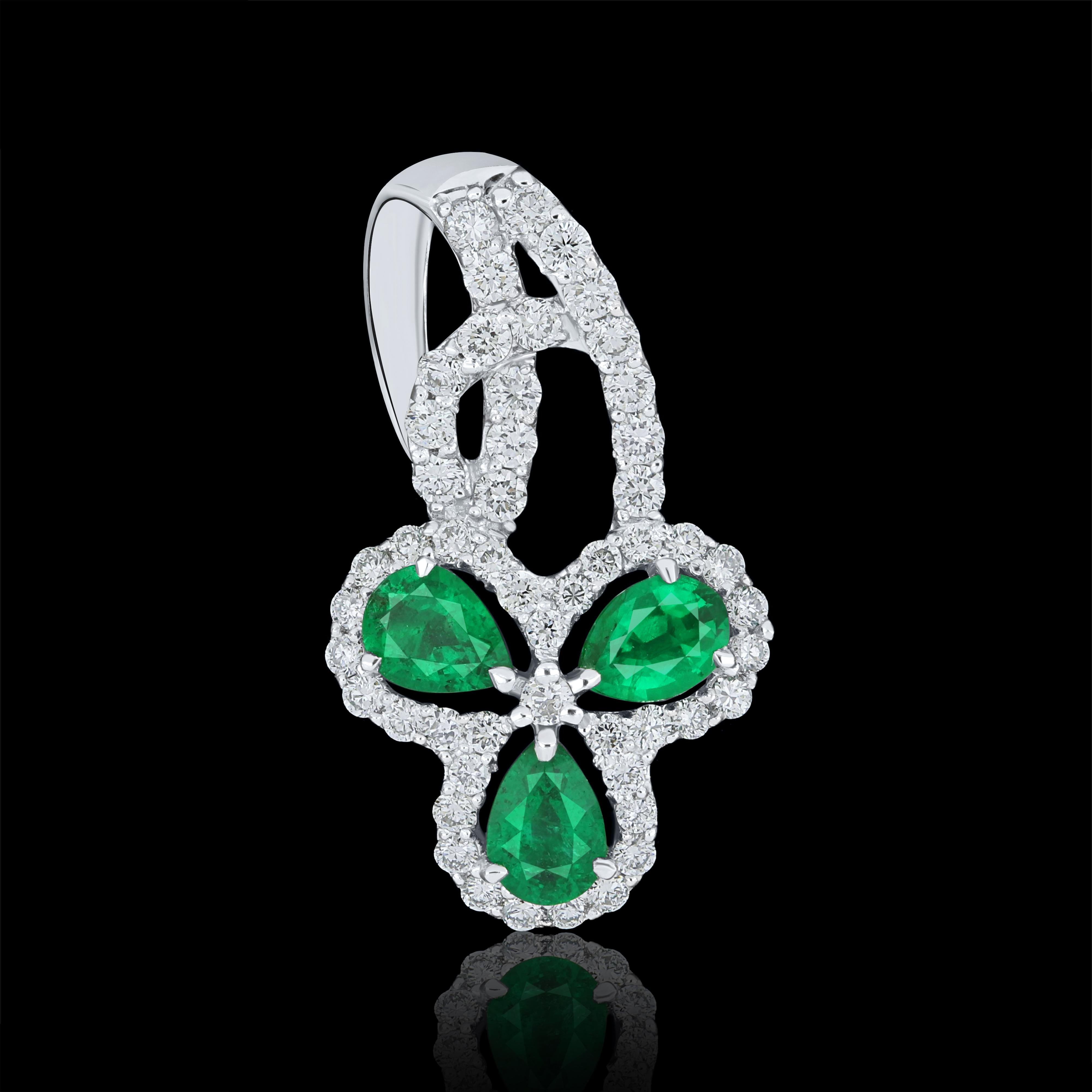 Elegant and exquisitely detailed 18 Karat White Gold Pendant, center set with 0.38Cts .Pear Shape Emerald and micro pave set Diamonds, weighing approx. 0.34Cts Beautifully Hand crafted in 18 Karat White Gold.

Stone Detail:
Emerald: 4x3MM

Stone