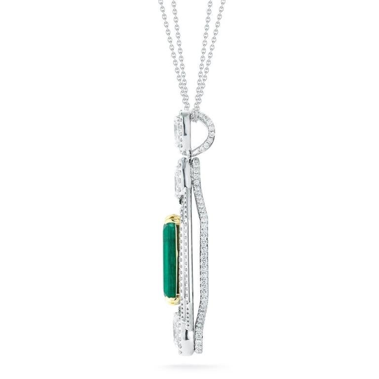 EMERALD AND DIAMOND PENDANT The angular diamond halo provides an appealing contrast to the elegance of the diamonds and Emeralds in this beautiful pendant. Item: # 02338 Metal: 18k W / Y Lab: Gia Color Weight: 13.72 ct. Diamond Weight: 4.51 ct.
