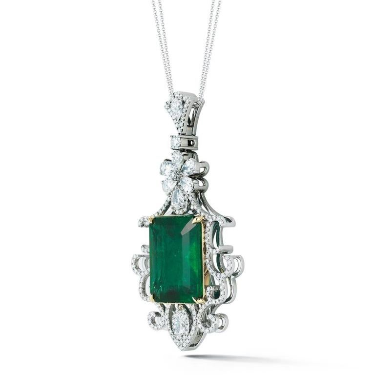 EMERALD AND DIAMOND PENDANT A french scroll motif in diamonds dances around a beautiful vibrant Emerald. Item: # 02360 Metal: 18k W Lab: Grs Color Weight: 28.06 ct. Diamond Weight: 4.35 ct.

