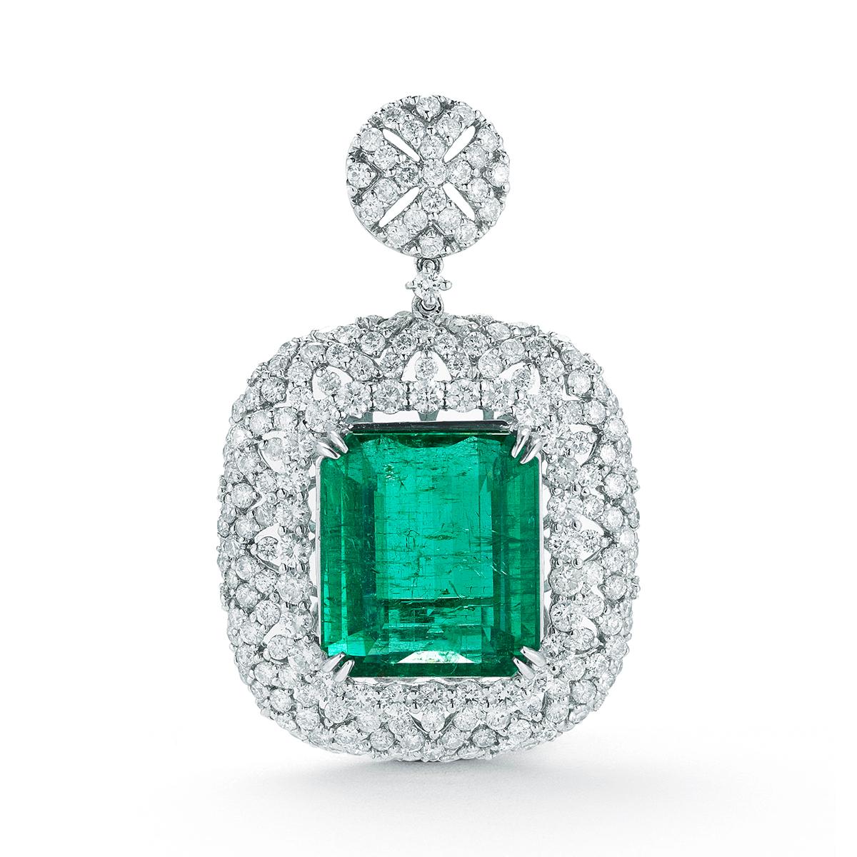 A vibrant Emerald shines in the center of this classic pendant 

Item: #02228
Metal: 18k W
Lab:	C.dunaigre
Color Weight: 15.30 ct.
Diamond Weight: 3.90 ct.