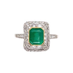 Emerald and Diamond Platinum Double Halo Cocktail Ring Estate Fine Jewelry