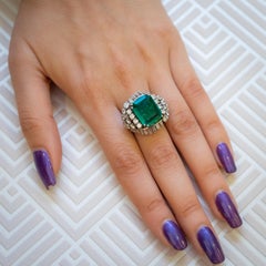 Vintage Emerald and Diamond Platinum Dress Ring, circa 1950