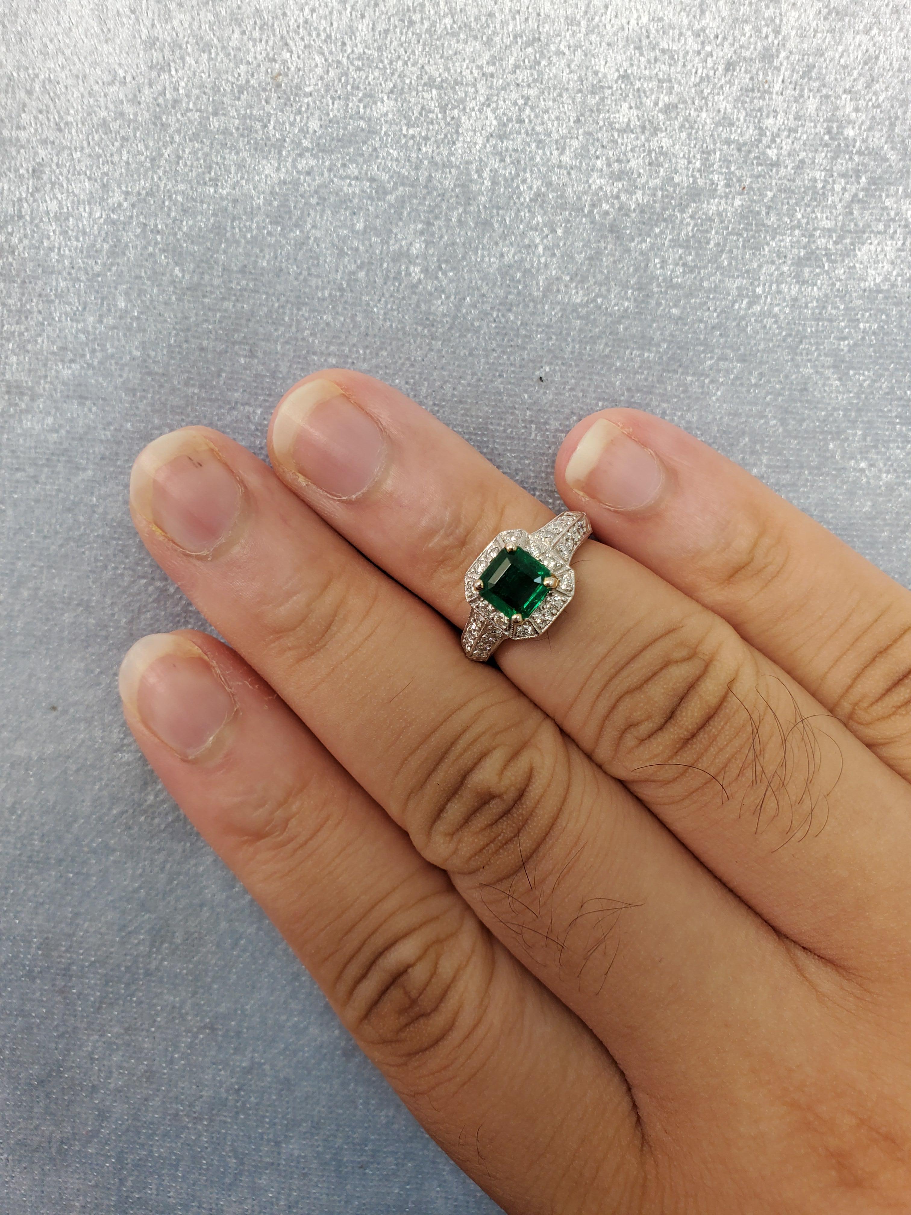 Emerald Cut Emerald and Diamond Platinum Engagement Ring For Sale