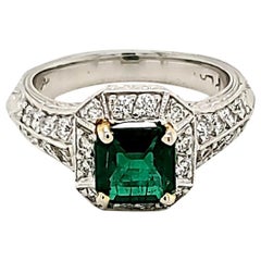 Used Emerald and Diamond Platinum Engagement Ring