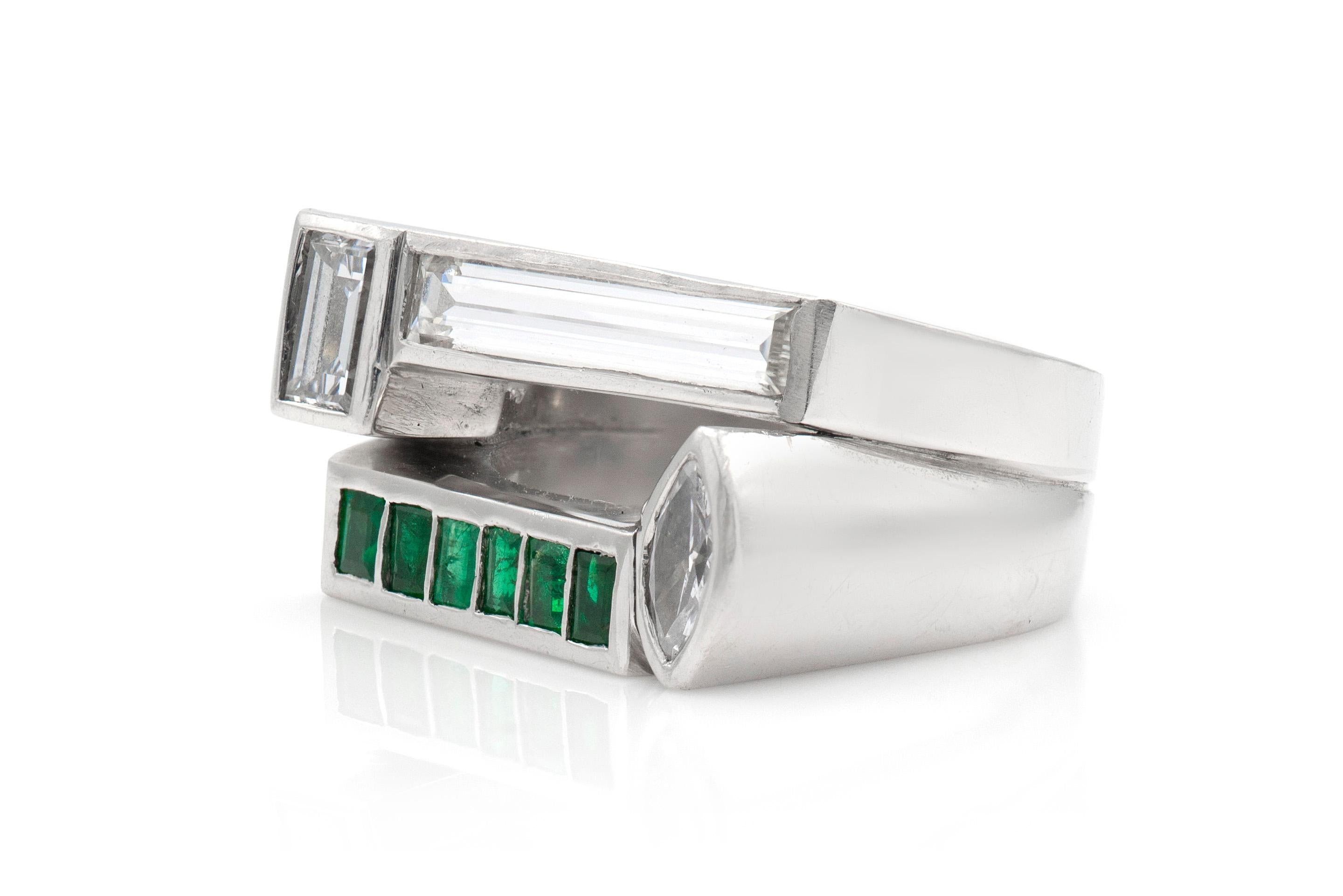 Finely crafted Platinum ring featuring emeralds weighing 2.00 carats, as well as emerald-, marquise- and baguette-cut diamonds weighing a total of 1.70 carats. 
Color: G-H