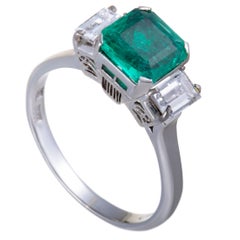 Emerald and Diamond Platinum Three-Stone Ring