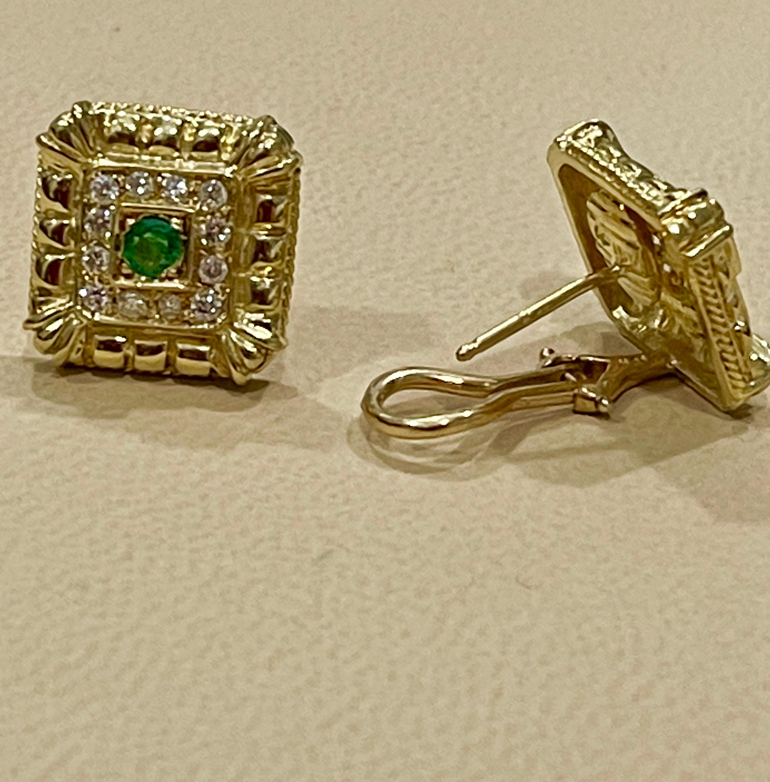 
 Emerald and Diamond  Post and Omega Back Earrings 18 Karat Yellow Gold
One round  Emeralds in the center approximately 0.15 ct  in each earring surrounded by brilliant cut round diamonds
Diamonds 24 Pieces , approximately 0.5 carat
Fine Natural