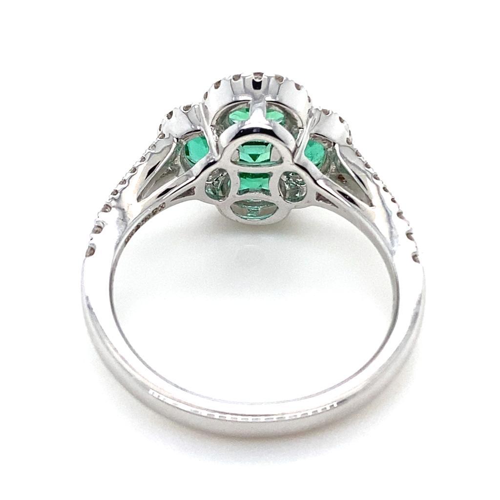 Emerald and Diamond Quatre Foil Cluster 18 Karat White Gold Engagement Ring In Good Condition For Sale In London, GB