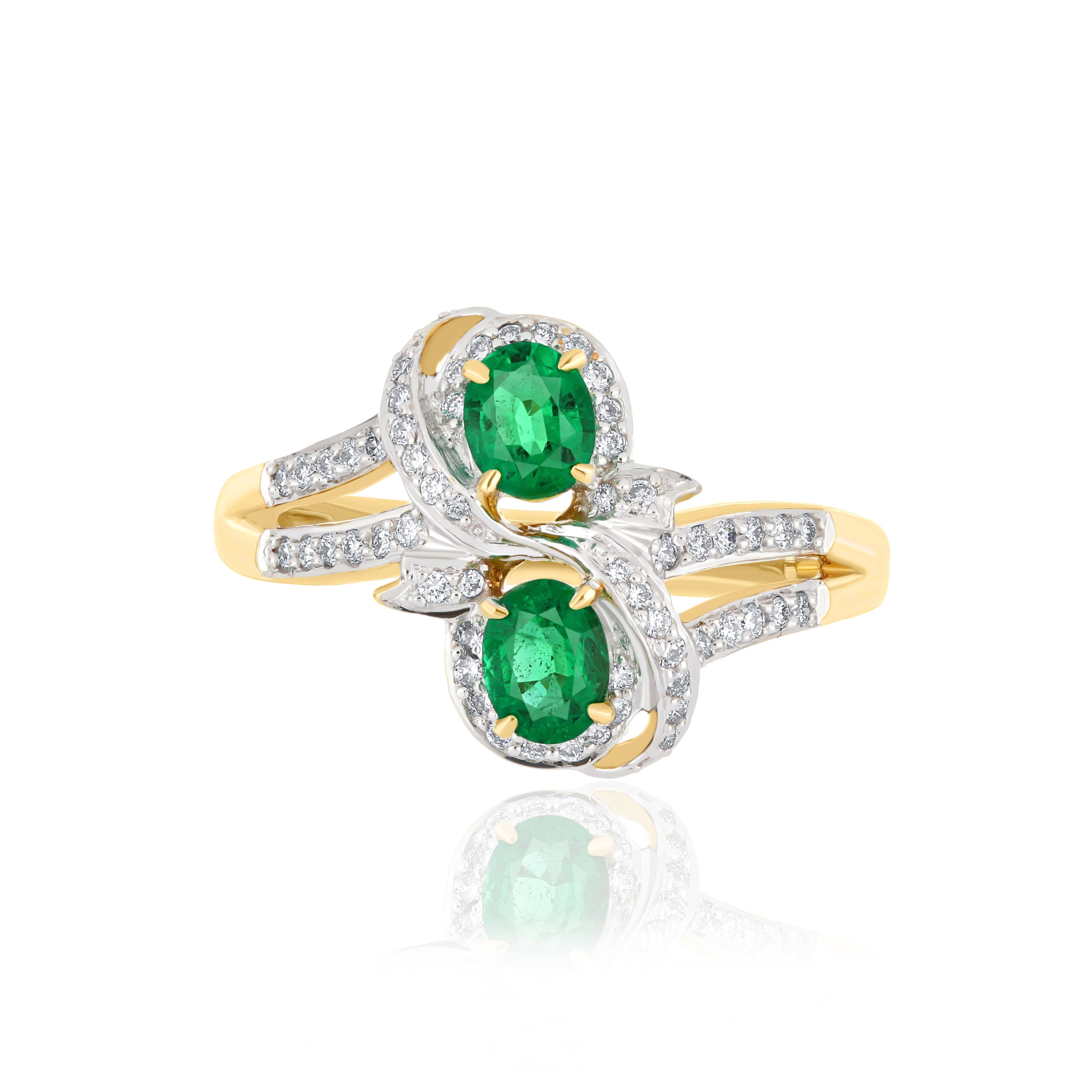 Elegant and exquisitely detailed 18 Karat Yellow Gold Ring, center set with 0.54Cts. Oval Shape Emerald and micro pave set Diamonds, weighing approx. 0.26Cts Beautifully Hand crafted in 18 Karat Yellow Gold.

Stone Detail:
Emerald: 5x4MM

Stone