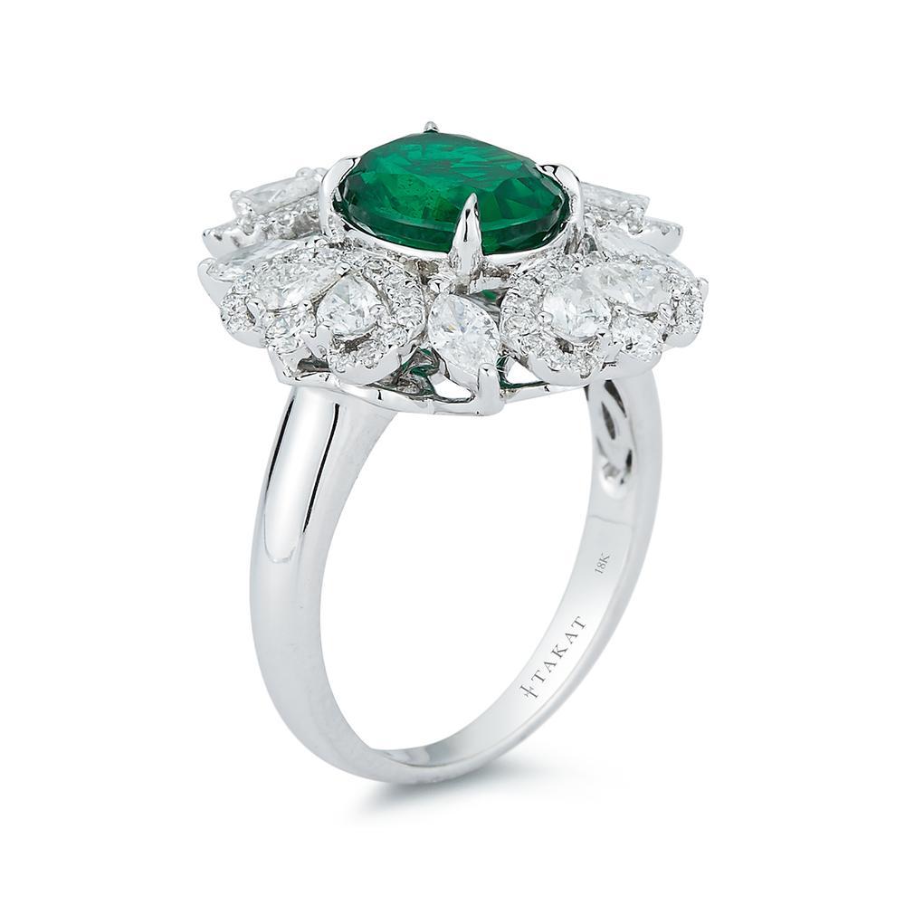 Modern Emerald And Diamond Ring 