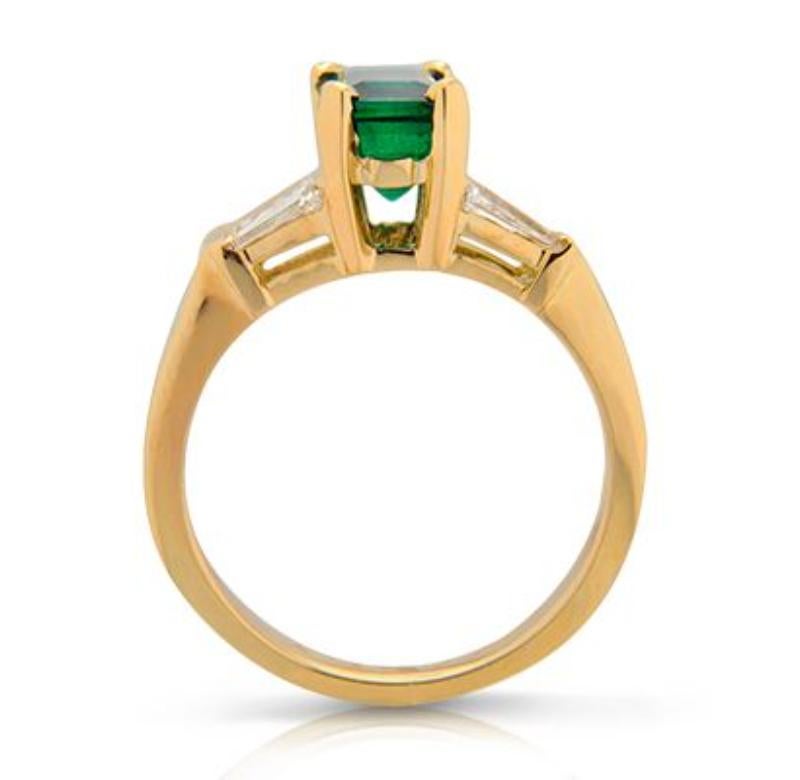 EMERALD AND DIAMOND RING
A classic treatment to feature a striking emerald.
Item: # 00825
Metal: 18k Y
Color Weight: 1.65 ct.
Diamond Weight: 0.47 ct.