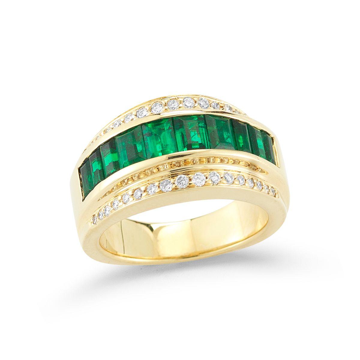 EMERALD AND DIAMOND RING
Perfectly matched emerald baguettes in a rich green upgrade a classic
band.
Item: # 02158
Metal: 18k Y
Color Weight: 1.95 ct.
Diamond Weight: 0.35 ct.