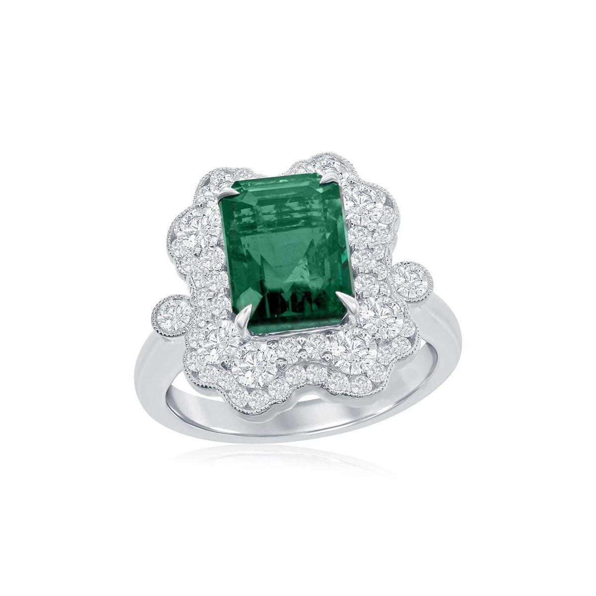 18k White Gold 3.63ct Emerald and 1.44ct Diamond Ring

A luxurious emerald sits in the center of a beautiful and elaborate
diamond setting.
Item: # 03143
Metal: 18k W
Lab: C.dunaigre
Color Weight: 3.63 ct.
Diamond Weight: 1.44 ct.